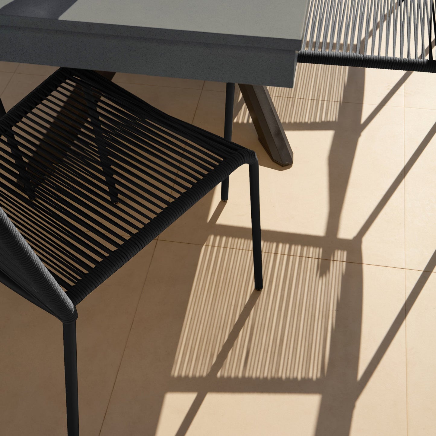 Amelia 6 Seater Dove Grey Concrete Garden Dining Set with Ryder Black Chairs - Laura James