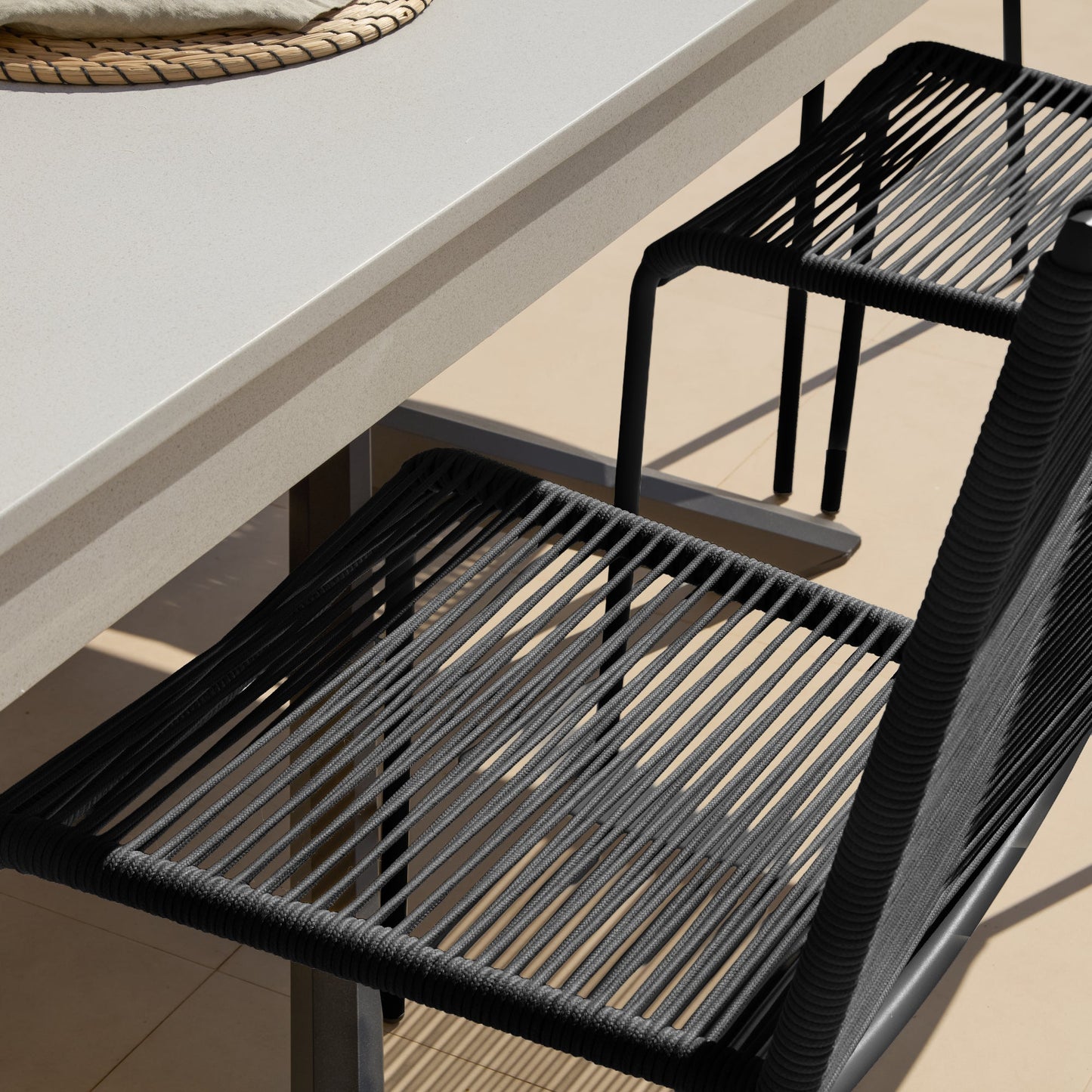 Amelia 6 Seater Pale Grey Concrete Garden Dining Set with Ryder Black Chairs - Laura James