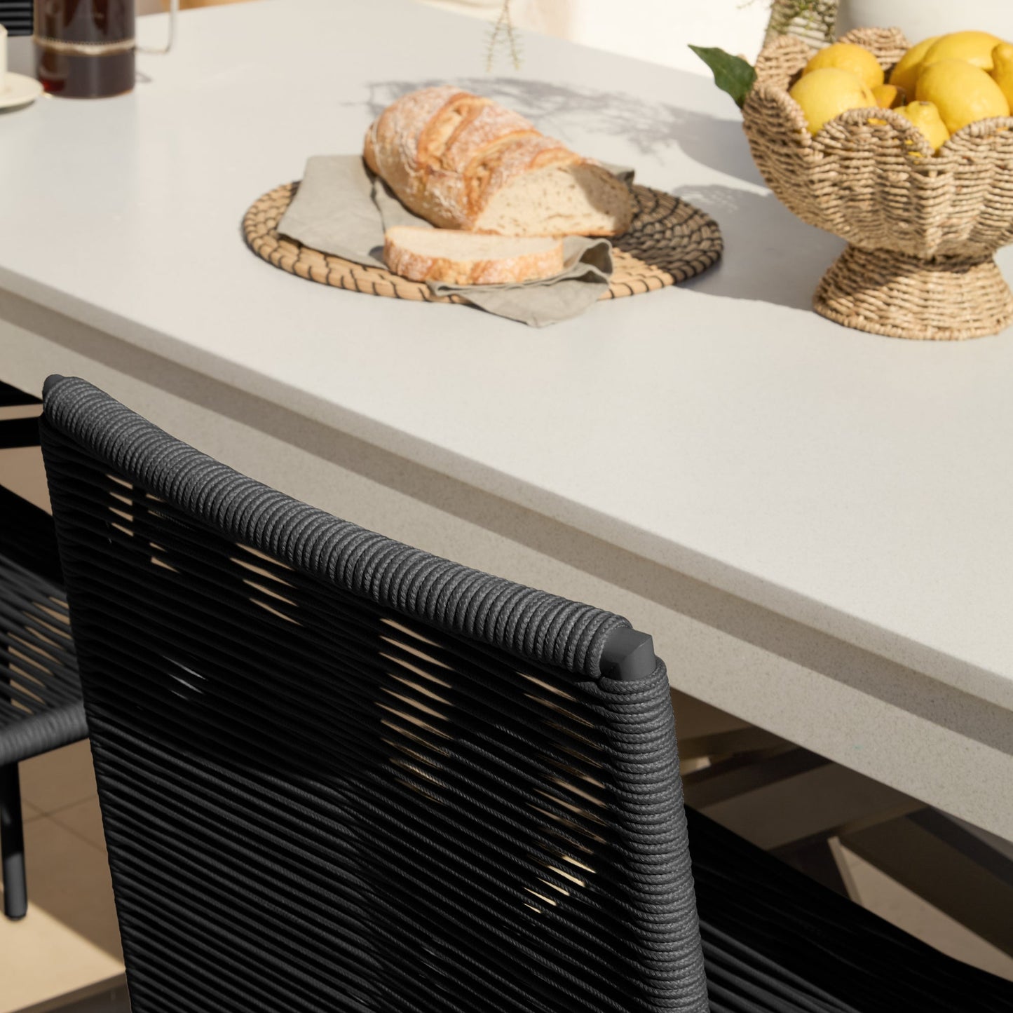 Amelia 6 Seater Pale Grey Concrete Garden Dining Set with Ryder Black Chairs - Laura James