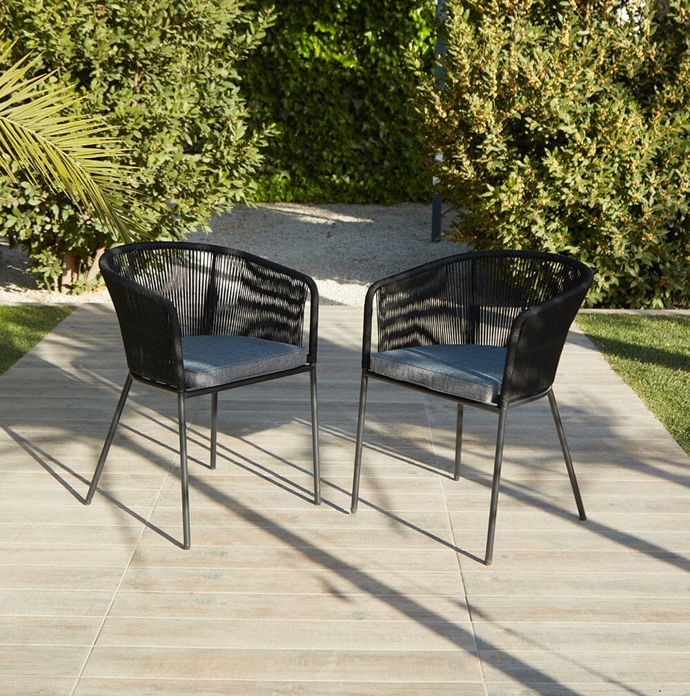 Shiro 6 seater wooden garden dining table with 6 hali black rope chairs and grey parasol - Laura James