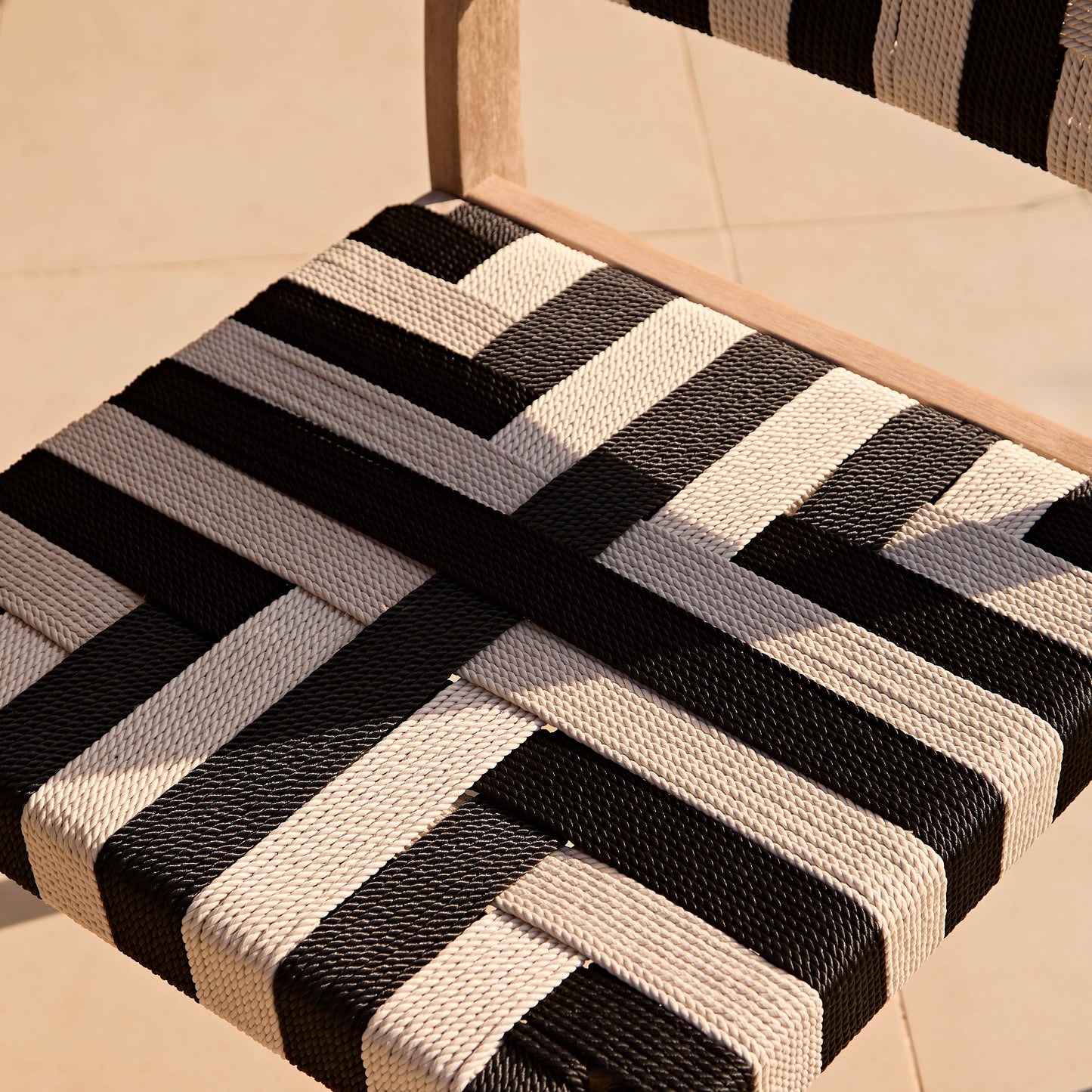 Saffron 6 Seater Extending Wooden Garden Dining Set with Saffron Black/Beige Chairs - Laura James