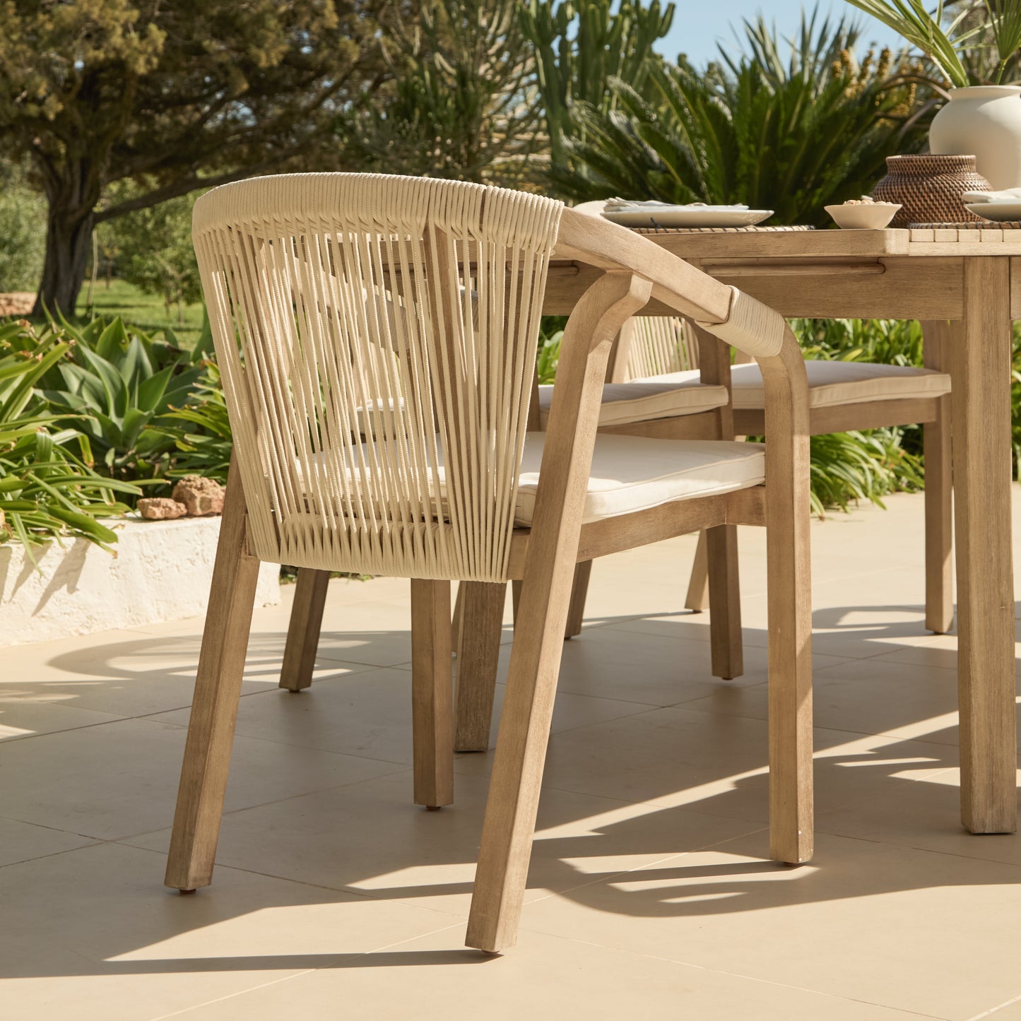Saffron 6 Seater Extending Wooden Garden Dining Set with Shiro Beige Rope Chairs - Laura James