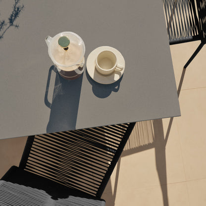 Amelia 6 Seater Dove Grey Concrete Garden Dining Set with Ryder Black Chairs - Laura James