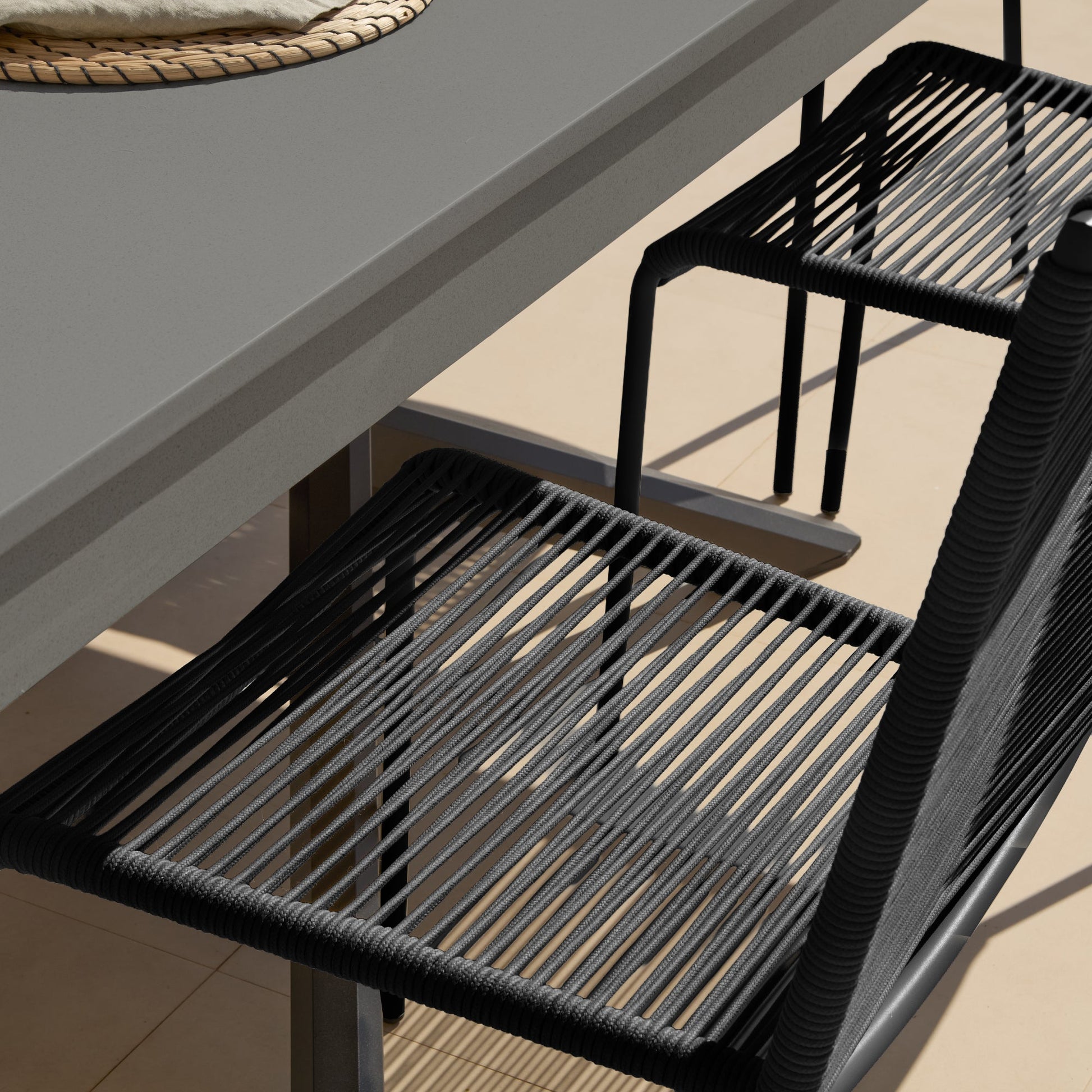 Amelia 6 Seater Dove Grey Concrete Garden Dining Set with Ryder Black Chairs - Laura James