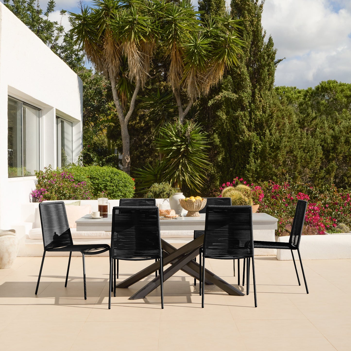 Amelia 6 Seater Pale Grey Concrete Garden Dining Set with Ryder Black Chairs - Laura James