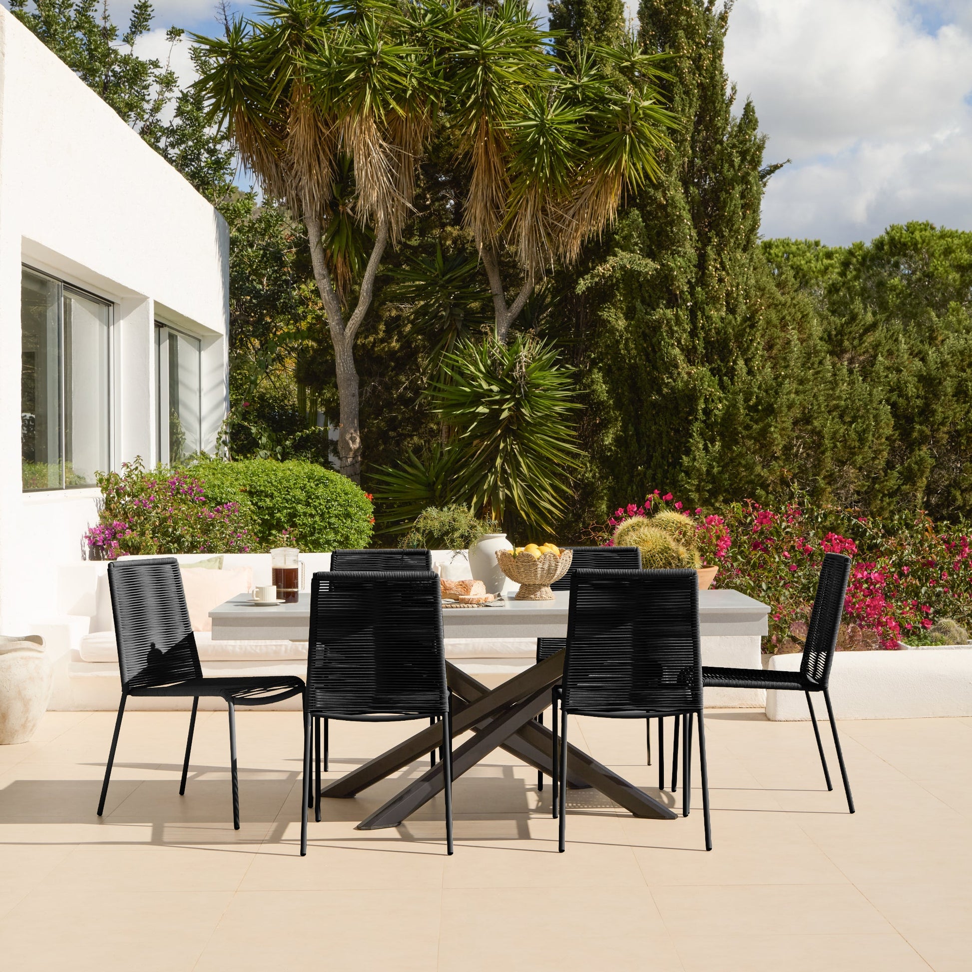 Amelia 6 Seater Pale Grey Concrete Garden Dining Set with Ryder Black Chairs - Laura James