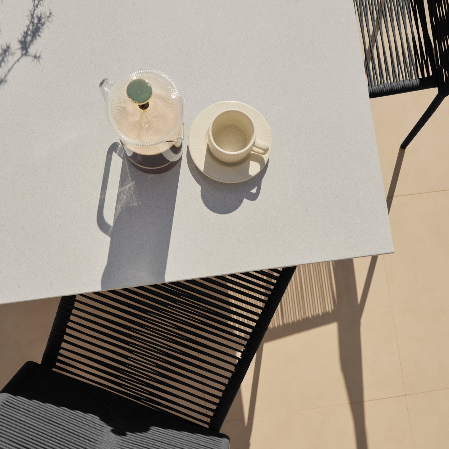 Amelia 6 Seater Pale Grey Concrete Garden Dining Set with Ryder Black Chairs - Laura James