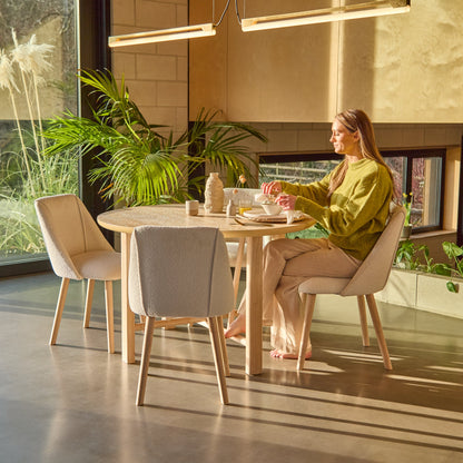 Carter Whitewash Round Dining Table with 4 Freya Boucle Dining Chairs with Whitewash Legs - Laura James 