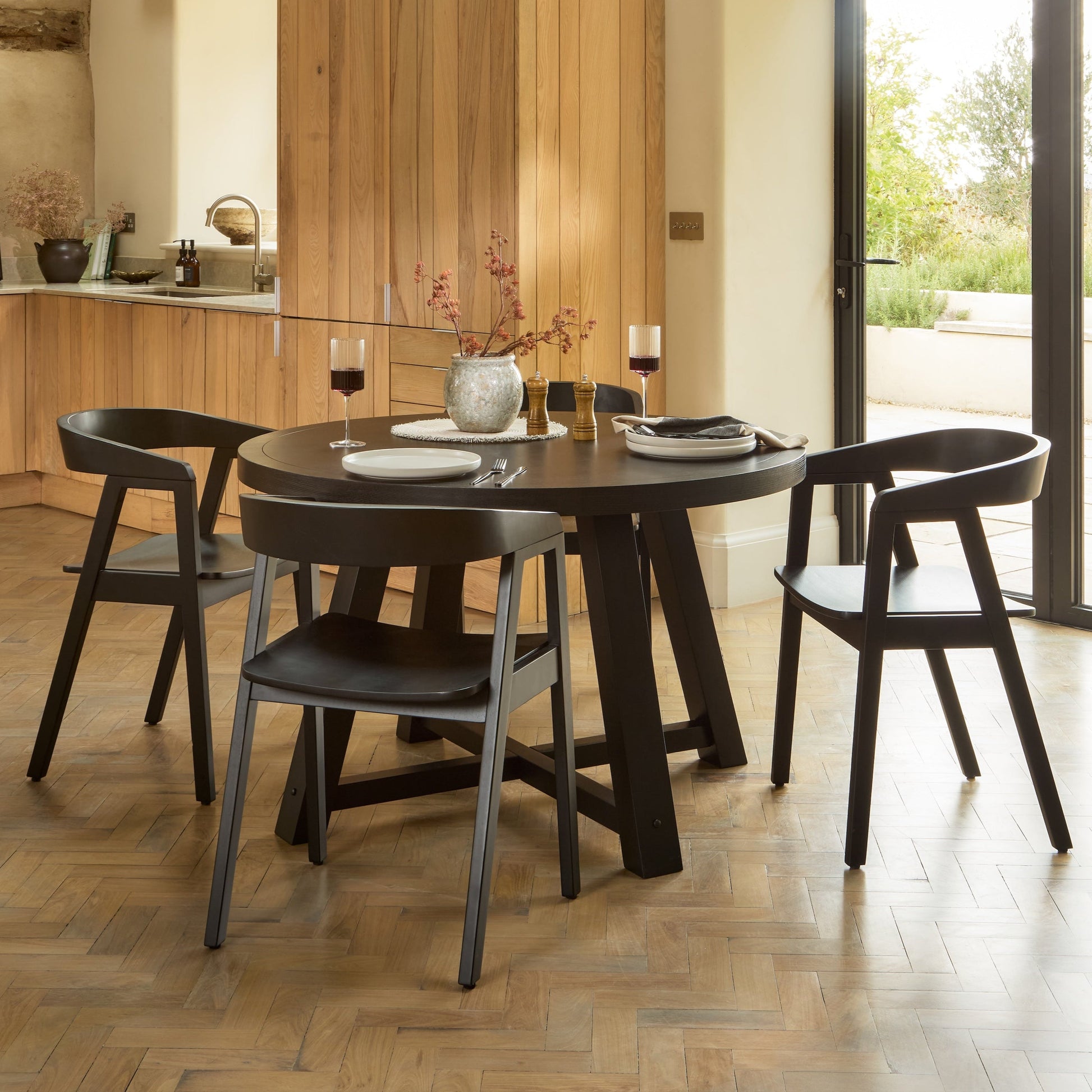 Charlotte Black Oak Round Dining Table Set - 4 Seater - Ella Black Oak Carver Chairs - Laura James