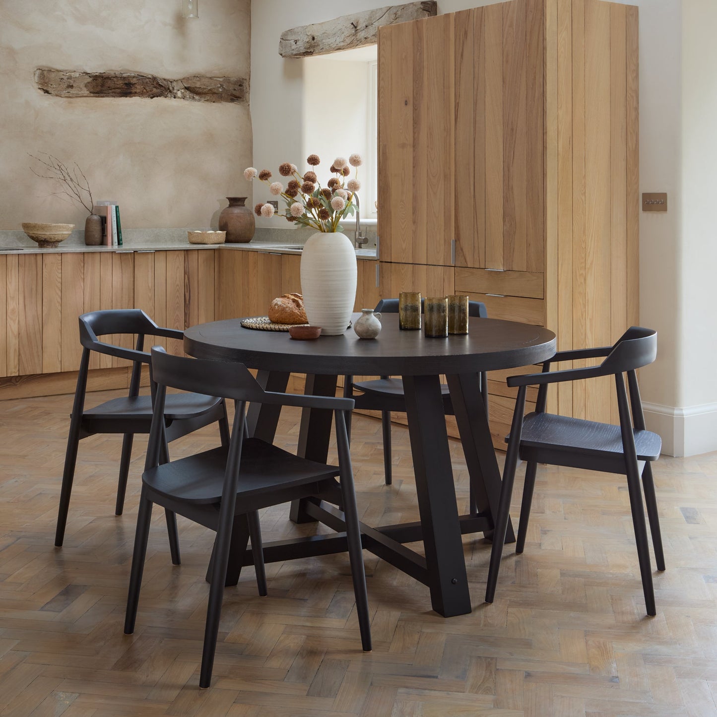 Charlotte Black Oak Round Dining Table Set - 4 Seater - Carter Black Oak Dining Armchairs - Laura James