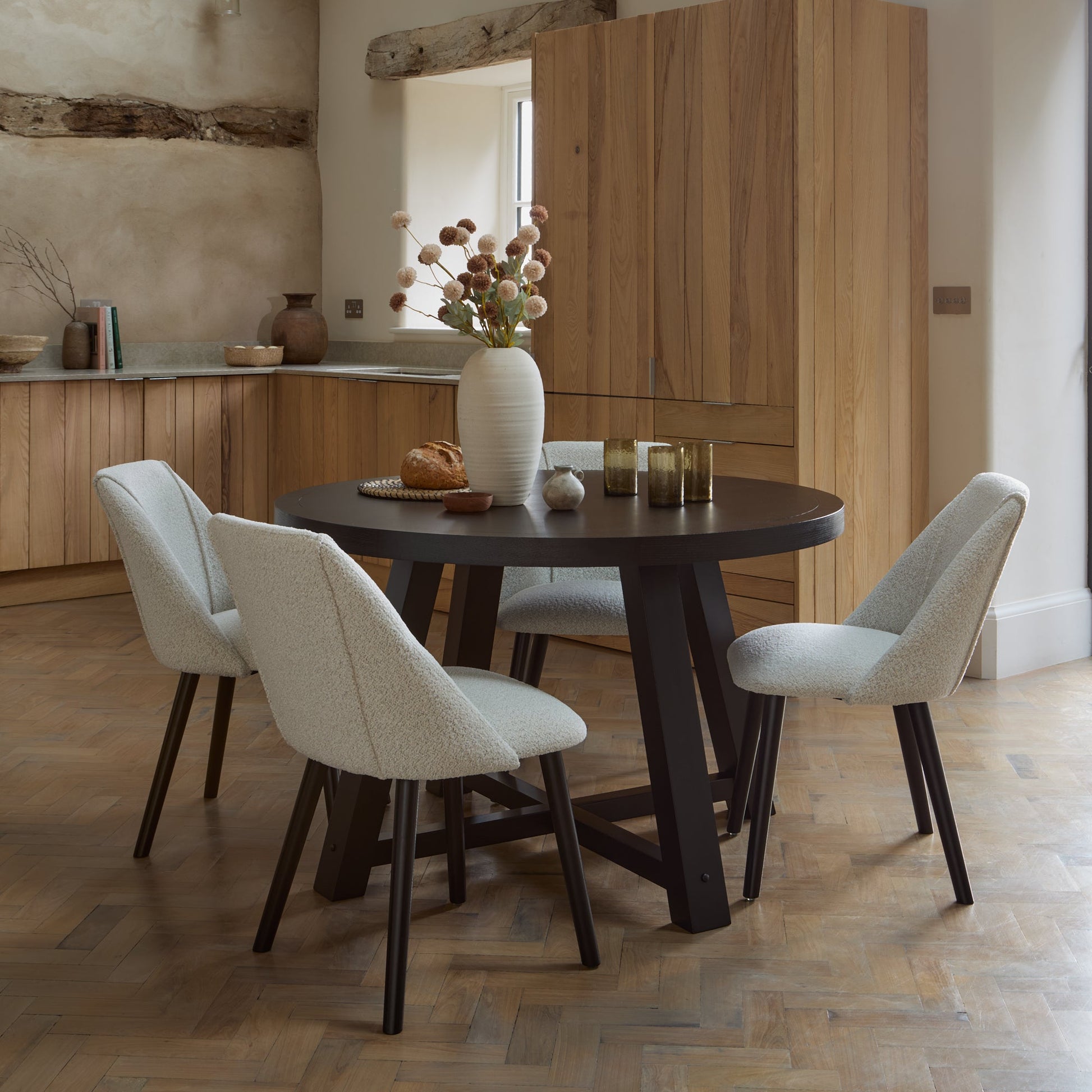 Charlotte Black Oak Round Dining Table Set - 4 Seater - Freya Oat Boucle Dining Chairs- Black Oak Legs - Laura James