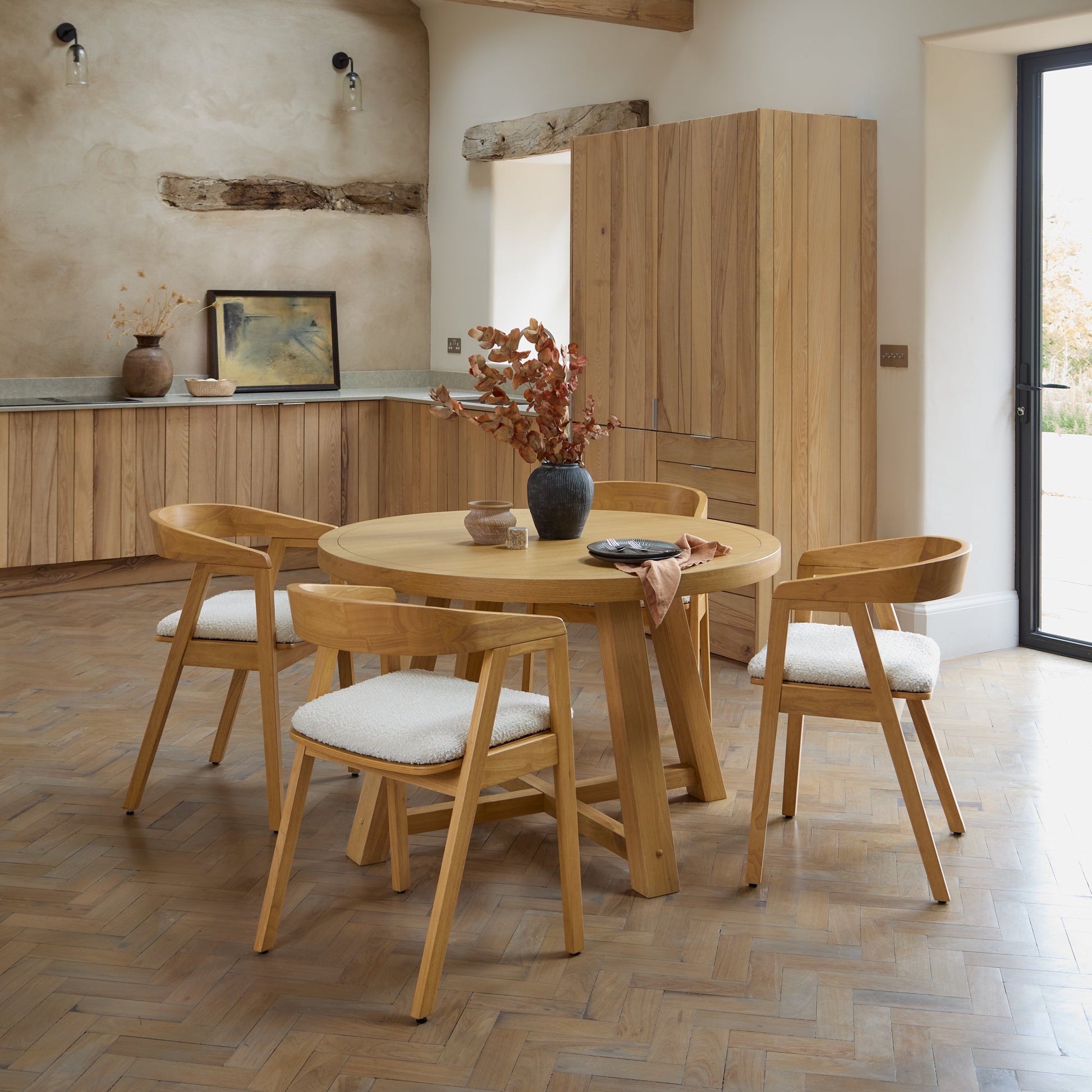 Charlotte Pale Oak Round Dining Table Set - 4 Seater - Ella Pale Oak Carver Chair - Off White Boucle - Laura James