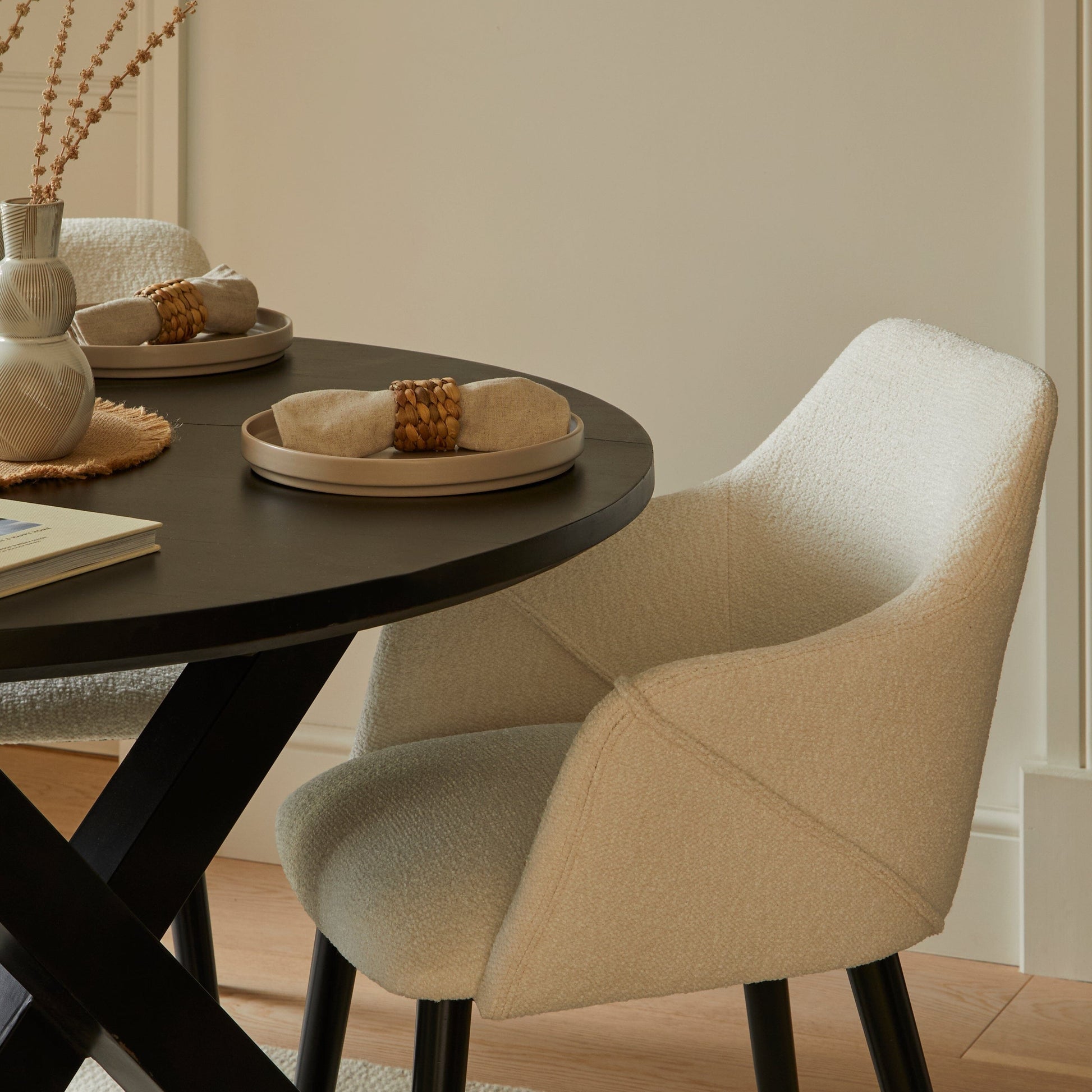 Levi Black Round Dining Table Set - 4 Seater - Freya Boucle Chairs with Black Legs - Laura James 