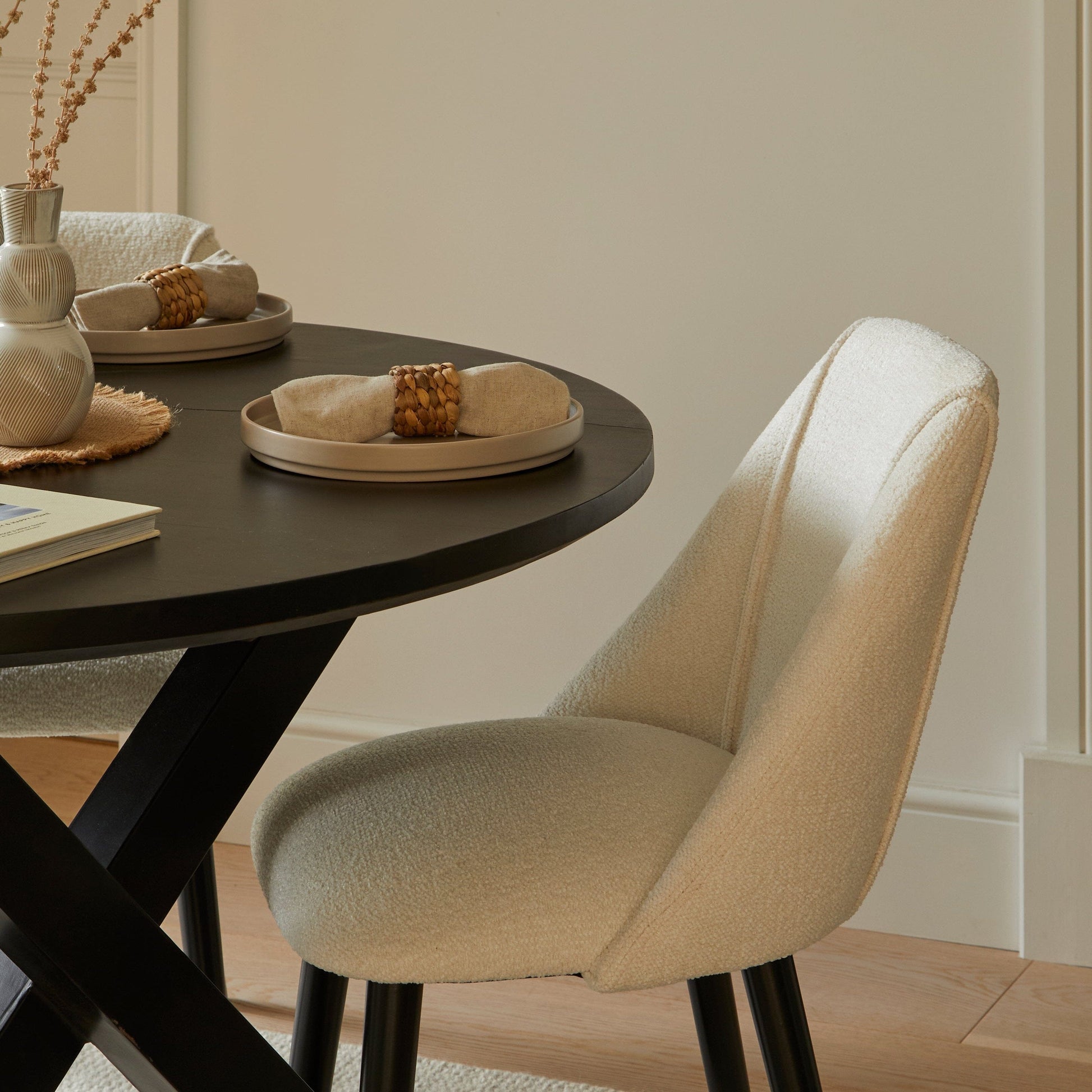 Levi Black Round Dining Table Set - 4 Seater - Freya Boucle Dining Chairs with Black Legs - Laura James 