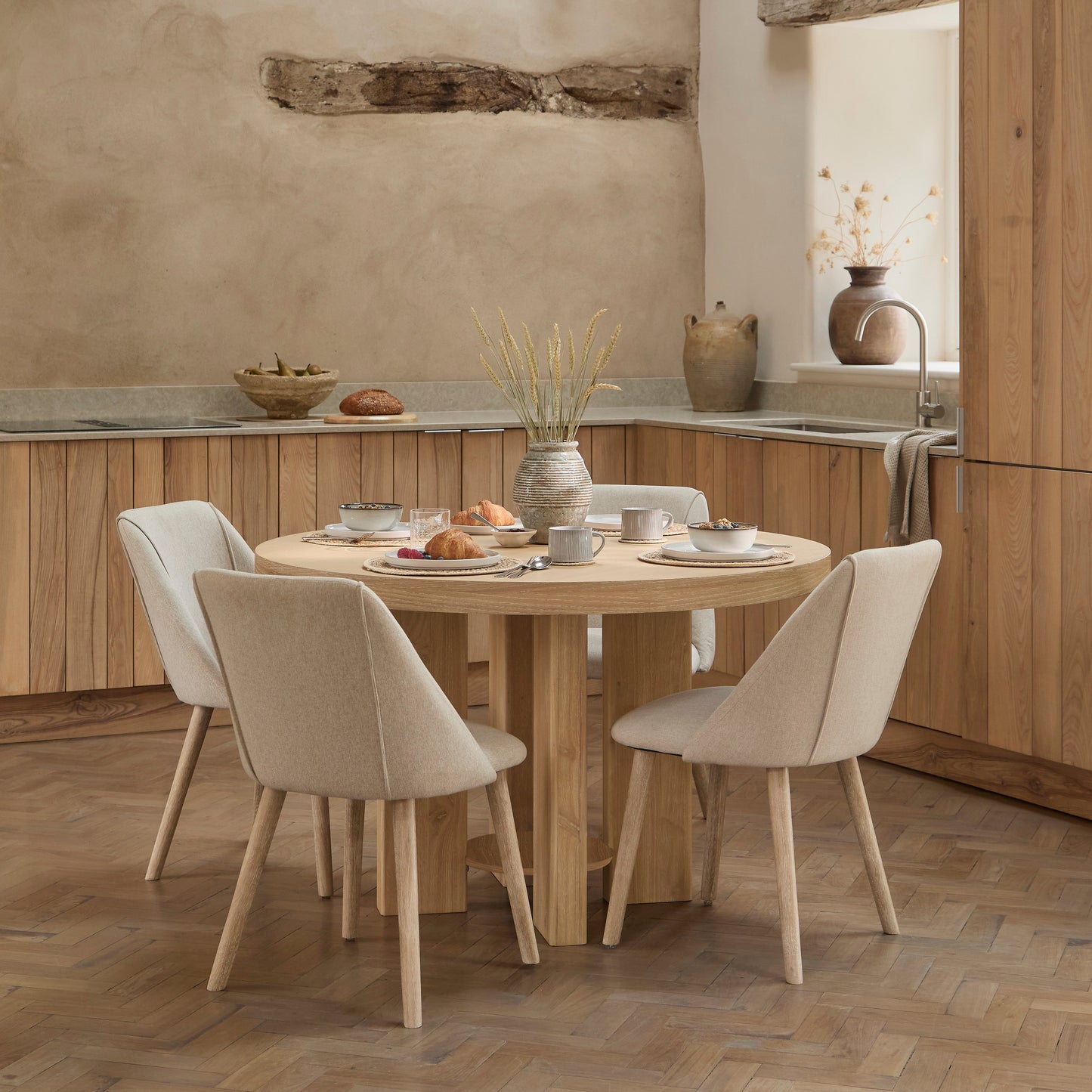 Marlon Whitewash Oak Round Dining Table Set - 4 Seater - Freya Sand Dining Chairs -  Whitewash Oak Legs - Laura James 