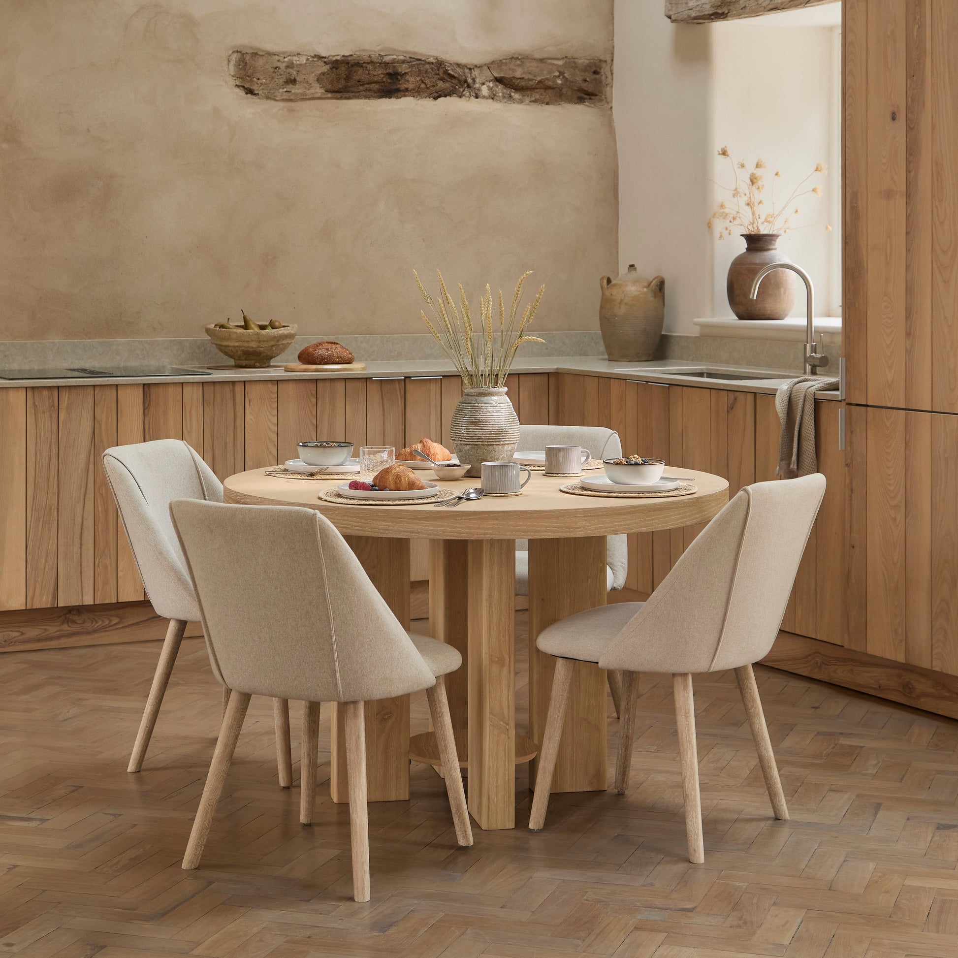 Marlon Whitewash Oak Round Dining Table Set - 4 Seater - Freya Sand Dining Chairs -  Whitewash Oak Legs - Laura James 
