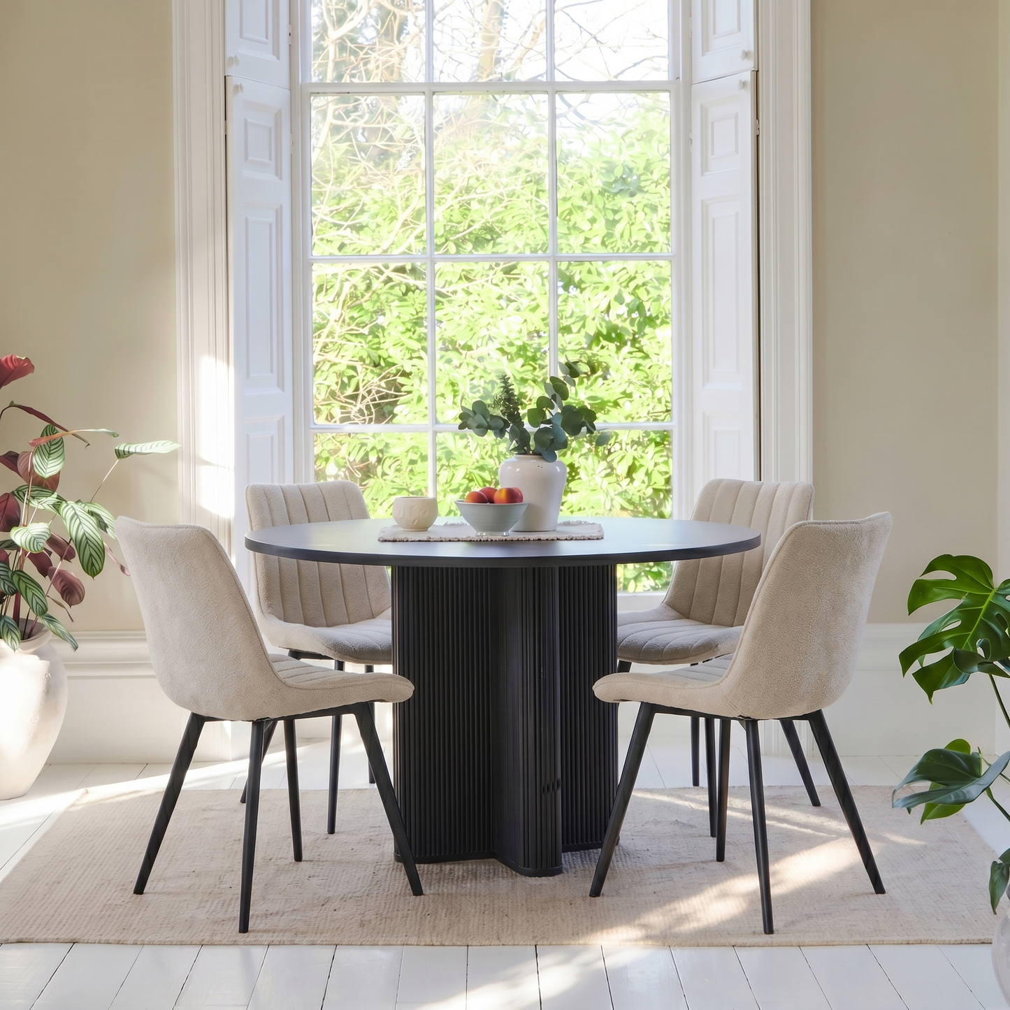 Orla Black Mango Wood Round Dining Table Set - 4 Seater - Bella Boucle Dining Chairs - Black Legs - Laura James