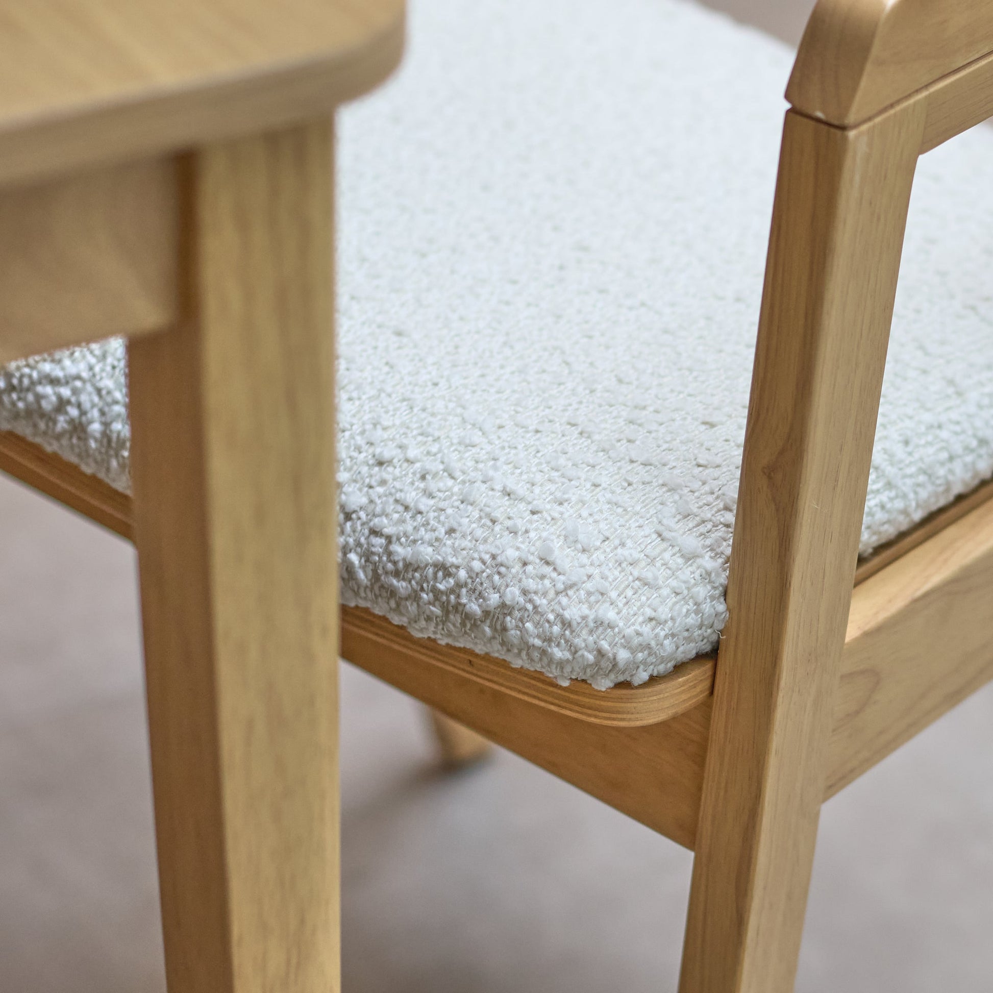 Paul Pale Oak Extending Dining Table Set - 4 Seater - Ella Off White Boucle Carver Chairs - Pale Oak Legs - Laura James