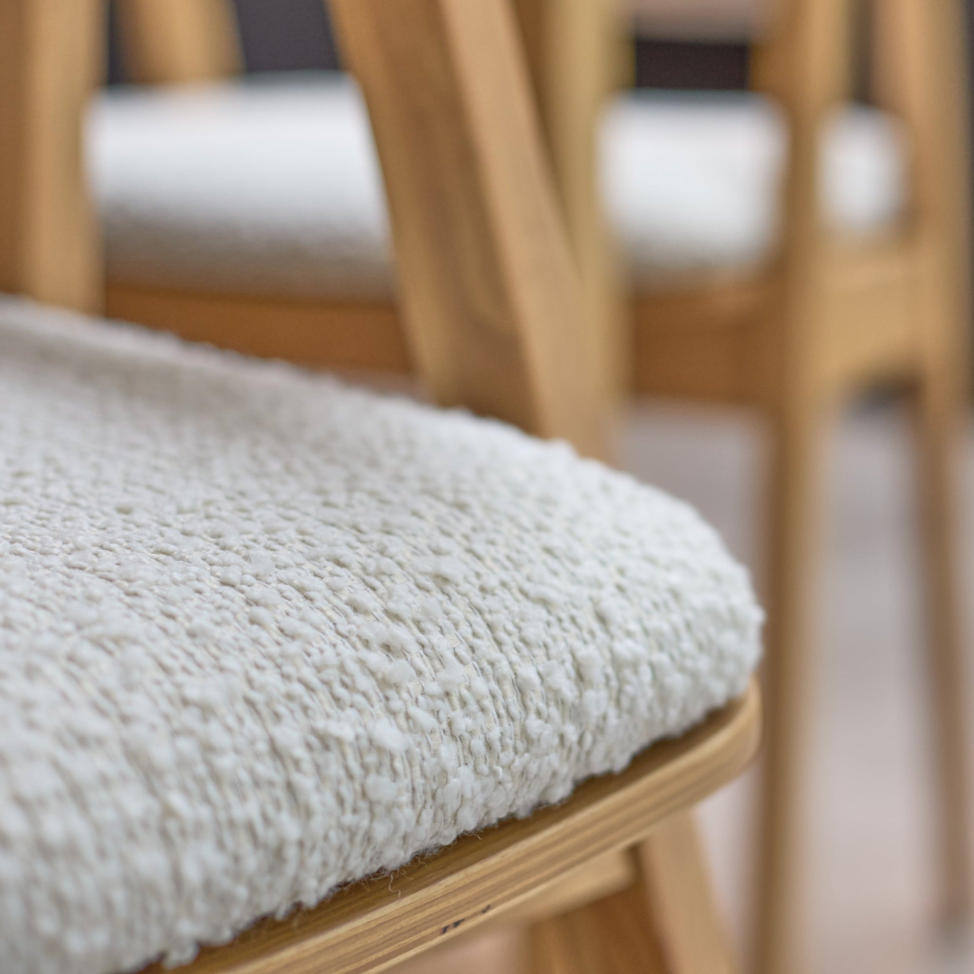 Paul Pale Oak Extending Dining Table Set - 4 Seater - Ella Off White Boucle Carver Chairs - Pale Oak Legs - Laura James