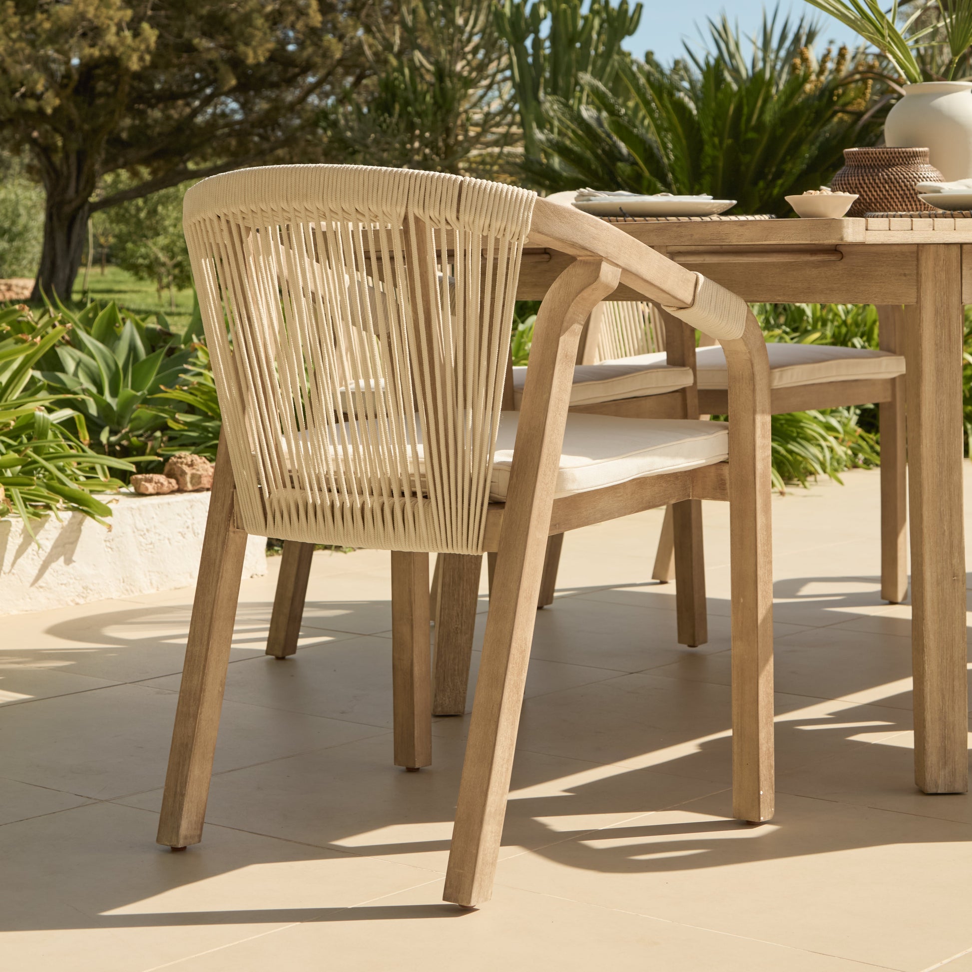 Saffron 6 Seater Extending Wooden Garden Dining Set with Shiro Beige Rope Chairs - Laura James