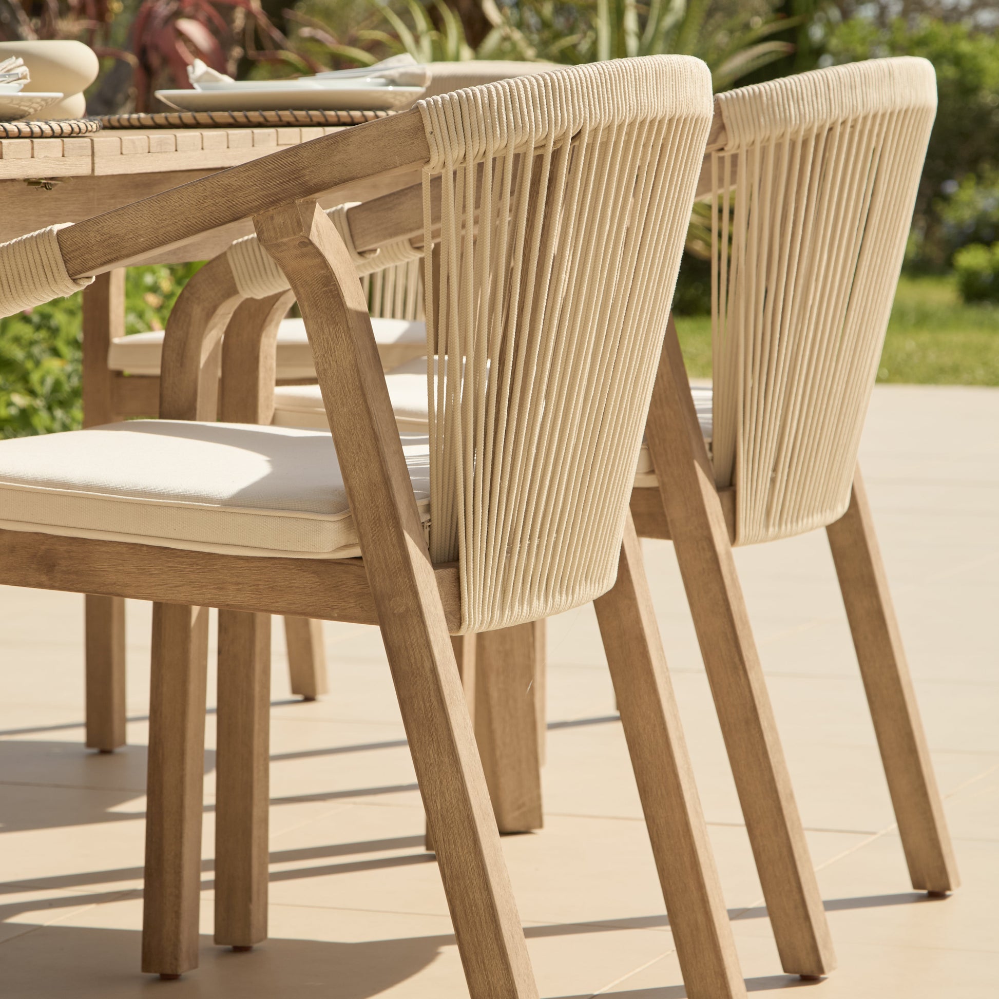 Saffron 6 Seater Extending Wooden Garden Dining Set with Shiro Beige Rope Chairs - Laura James