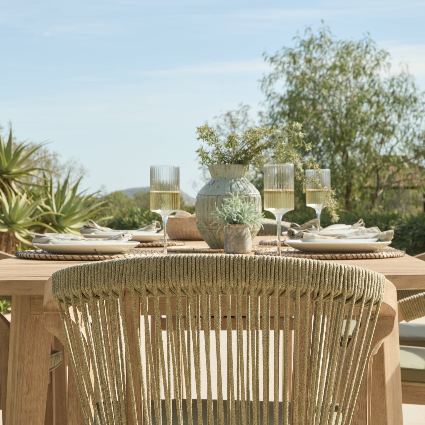 Saffron 6 Seater Extending Wooden Garden Dining Set with Shiro Green Rope Chairs - Laura James