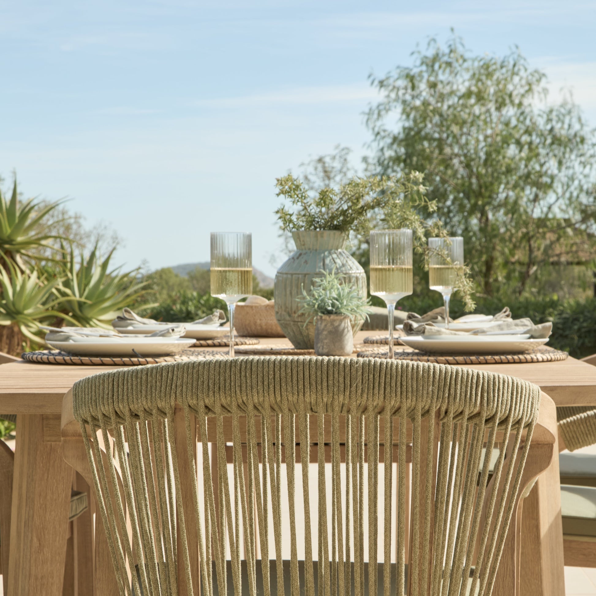 Saffron 6 Seater Extending Wooden Garden Dining Set with Shiro Green Rope Chairs - Laura James