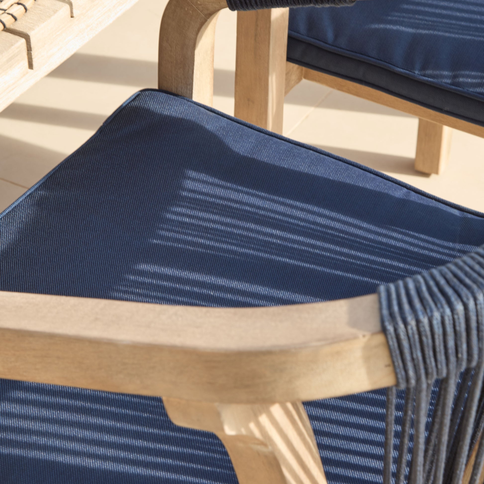 Saffron 6 Seater Extending Wooden Garden Dining Set with Shiro Navy Rope Chairs - Laura James