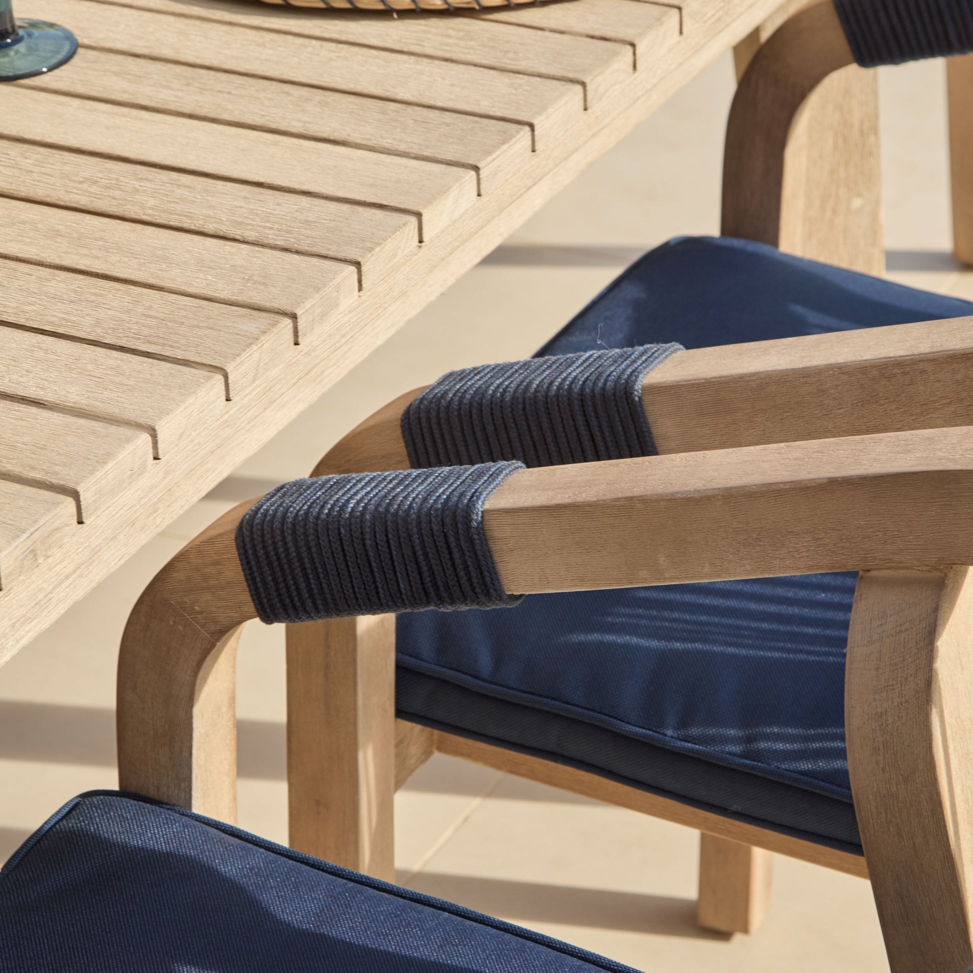 Saffron 6 Seater Extending Wooden Garden Dining Set with Shiro Navy Rope Chairs - Laura James
