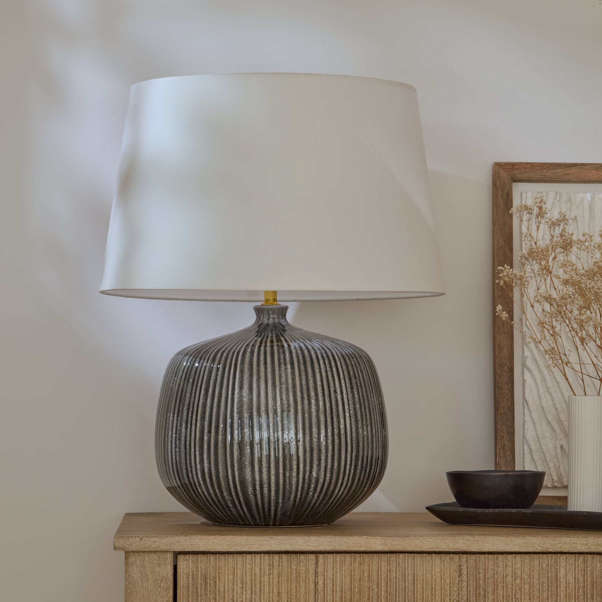 Tongham 31cm Ceramic Lamp Base - Dark Grey & Coningsby 40cm Cotton Lamp Shade - Snow White - Laura James