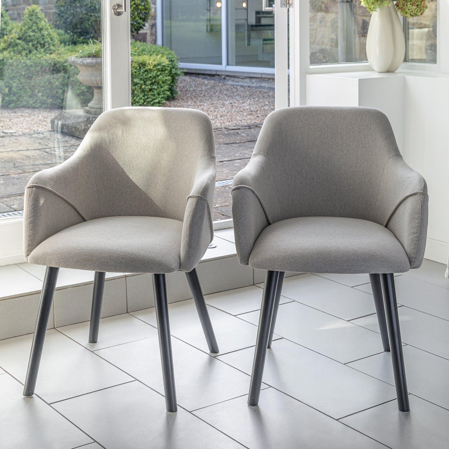 Amelia Whitewash Extendable Dining Table Set - 6 Seater - Freya Oatmeal Carver Chairs With Black Legs - Laura James