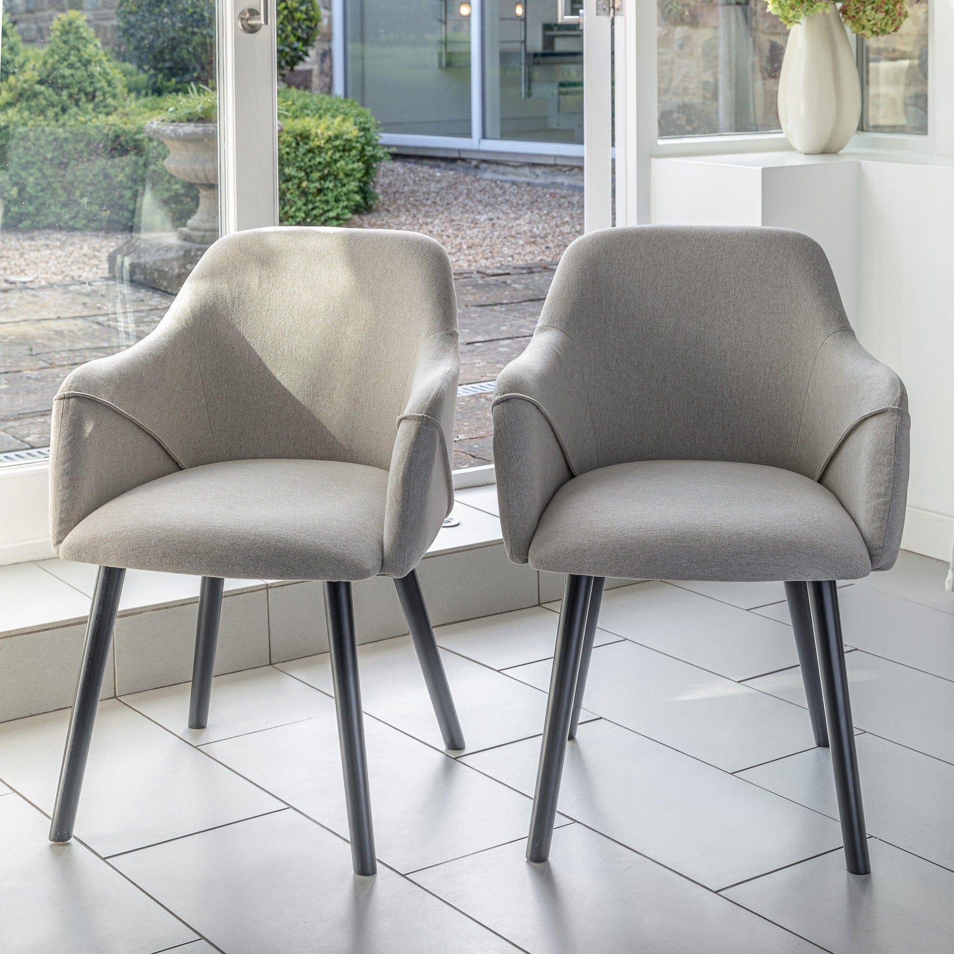 Amelia Whitewash Extendable Dining Table Set - 6 Seater - Freya Oatmeal Carver Chairs With Black Legs - Laura James
