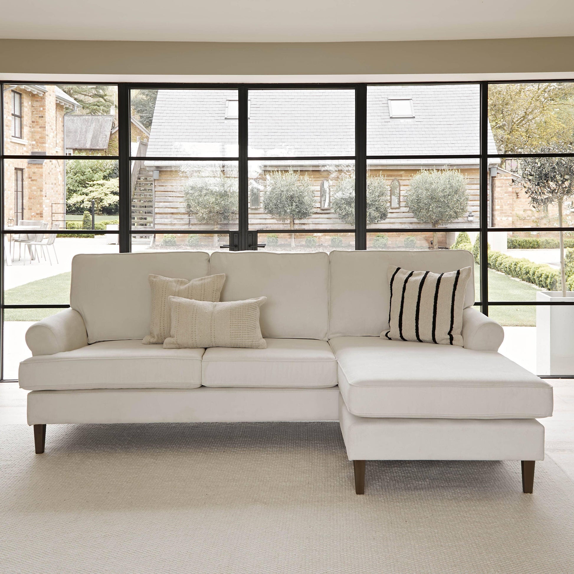 Annabelle corner sofa with chaise Natural Ivory with Dark Oak Legs - Laura James