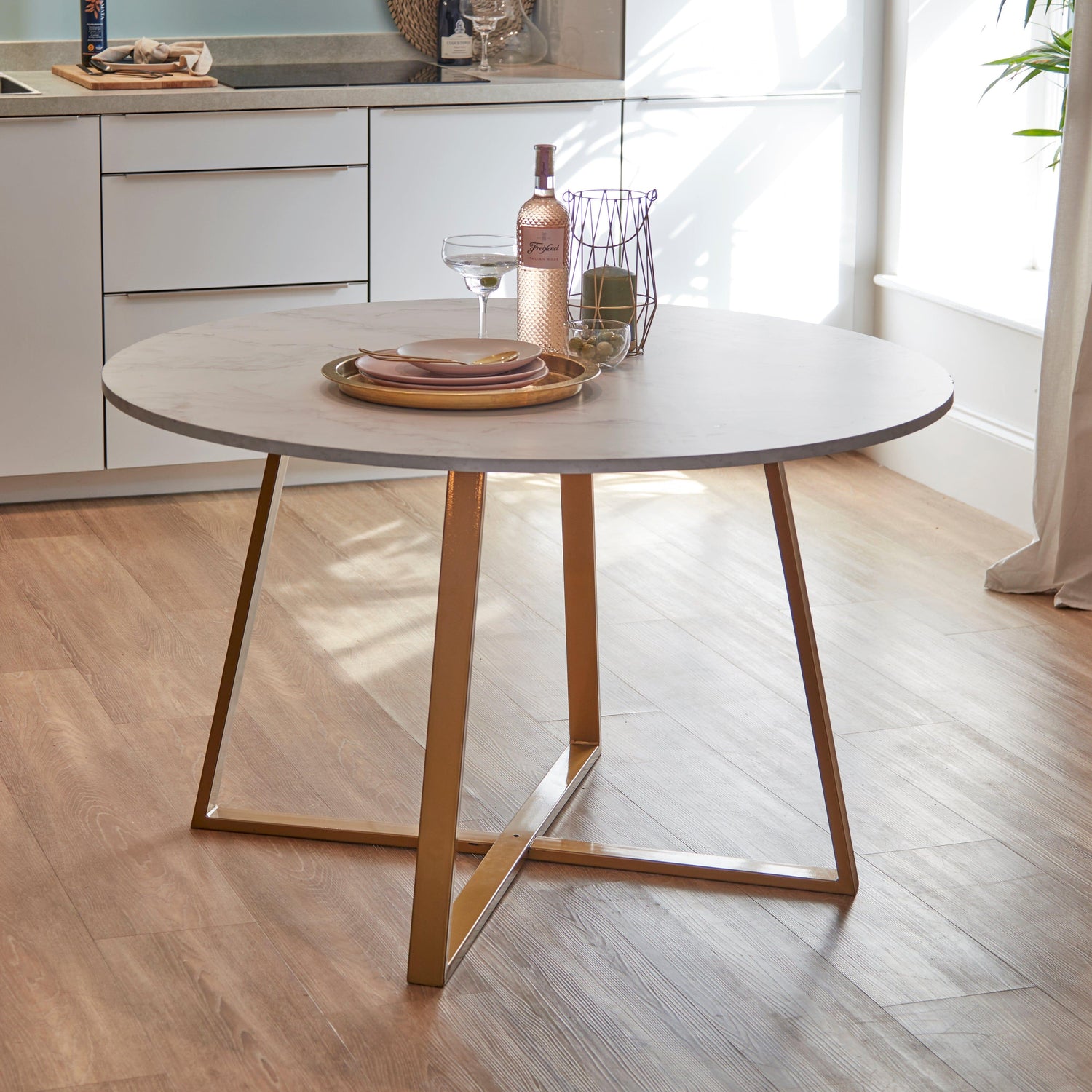 Clara marble effect round dining table - with gold frame - Laura James