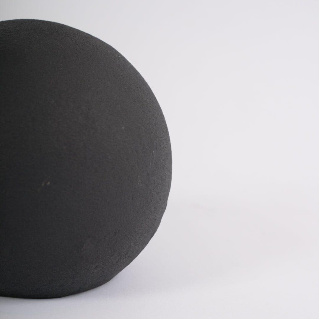 Large black ceramic ball decoration - Laura James