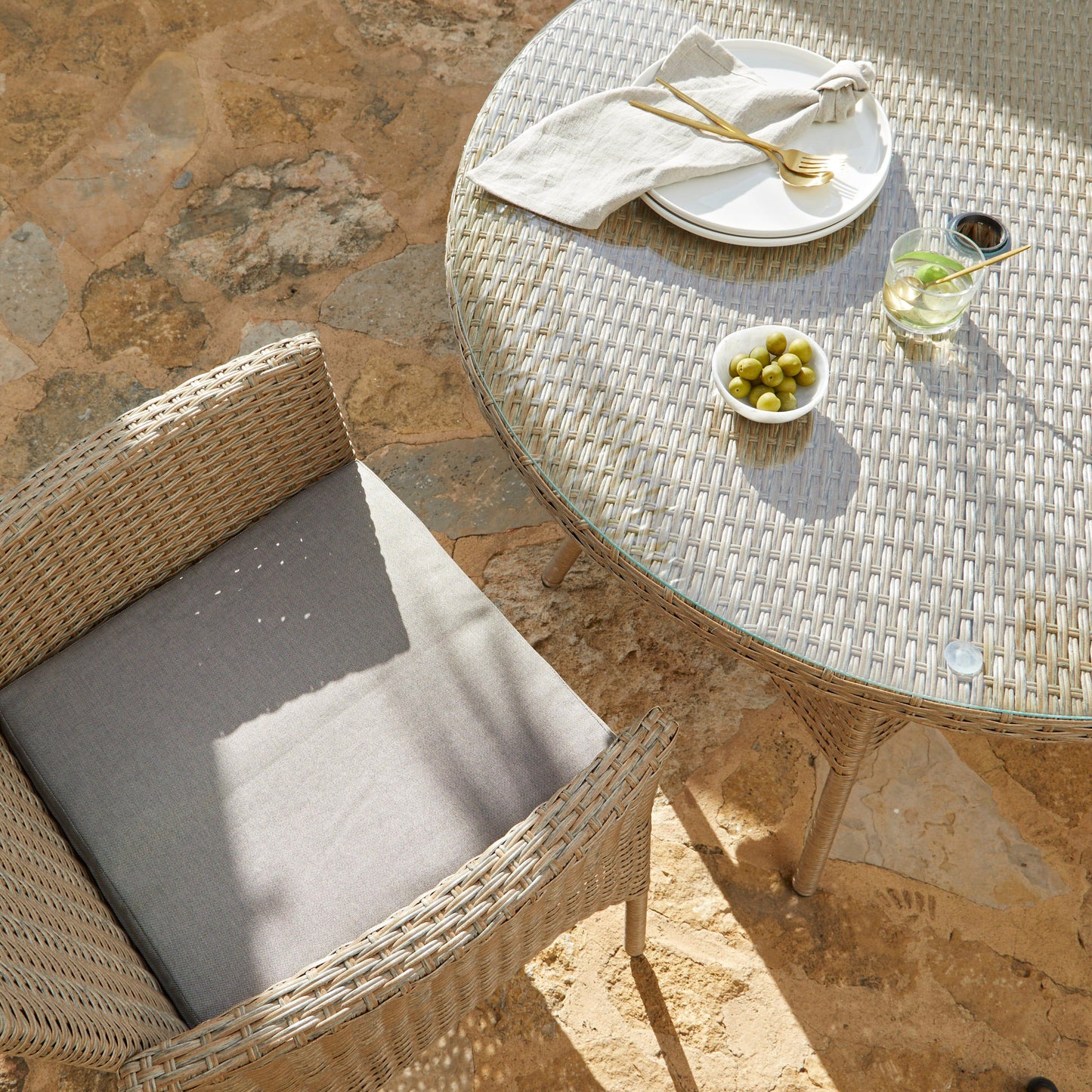 Kemble 6 Seater Rattan Round Dining Set with Cream Parasol - Natural Brown - Laura James