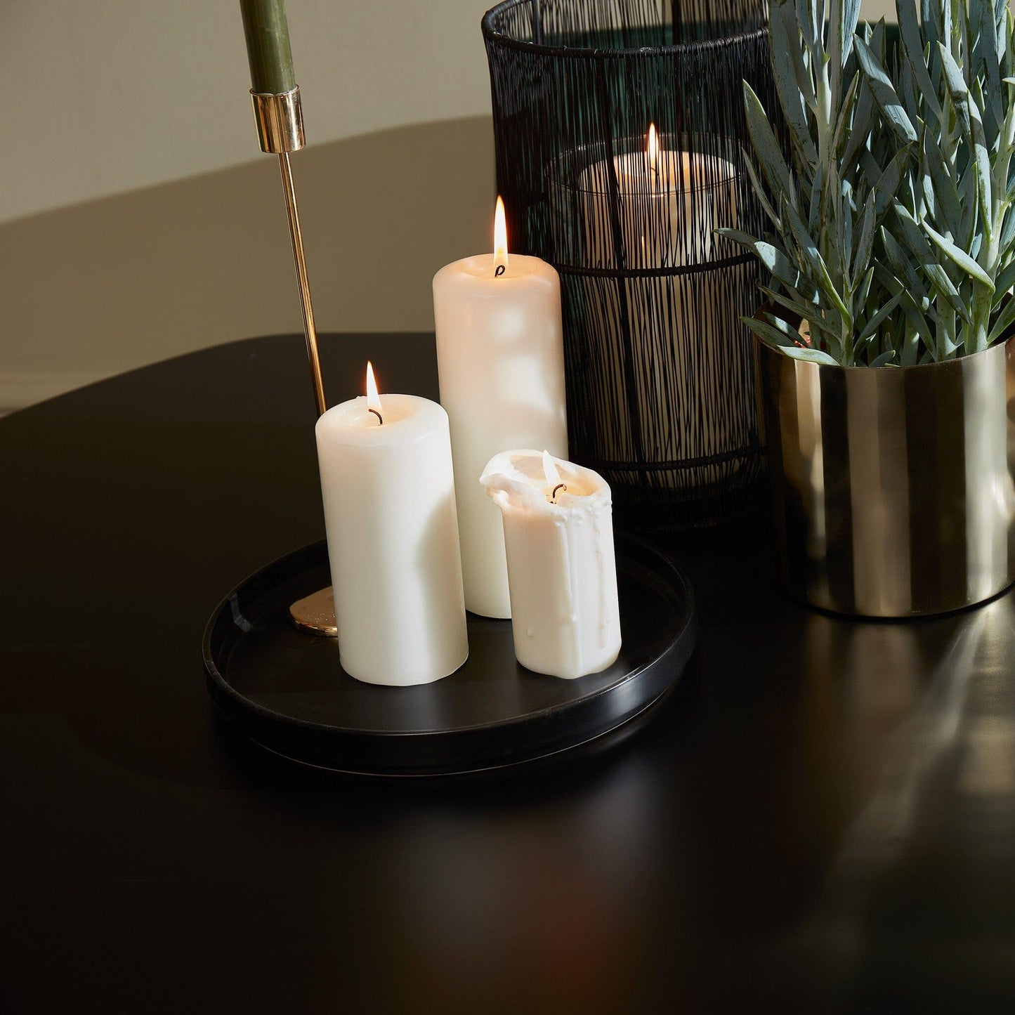 Lua Black Extendable Dining Table with Gold Legs - Laura James