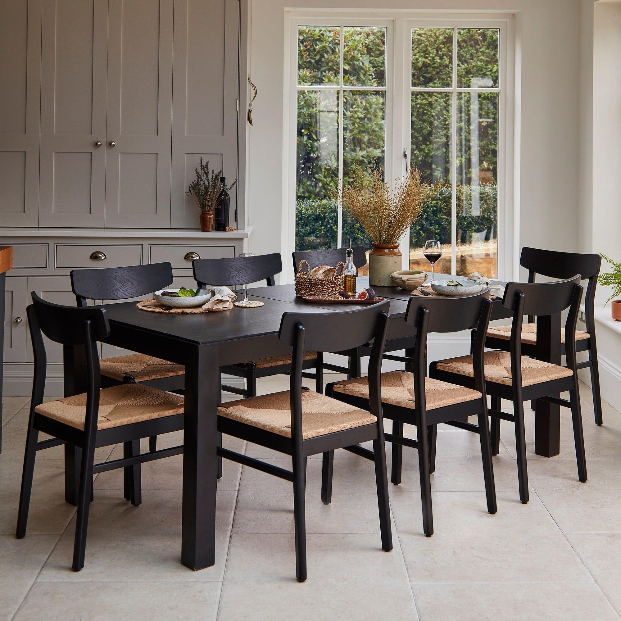 Magnus Black Extendable Dining Set & 8 Woven Chairs - Laura James