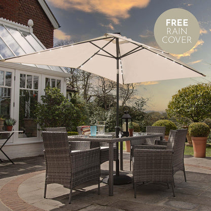 Marston 6 Seater Rattan Outdoor Dining Set with Cream LED Premium Parasol - Rattan Garden Furniture - Grey - Glass Top - Laura James