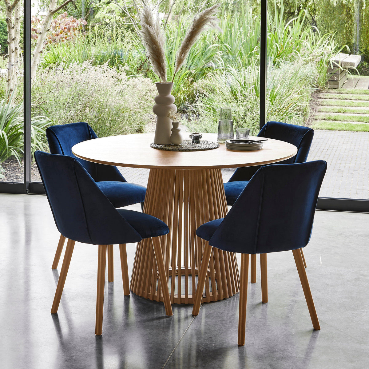 Dining Table and 4 Chairs by Laura James: Timeless Design Meets Comfort