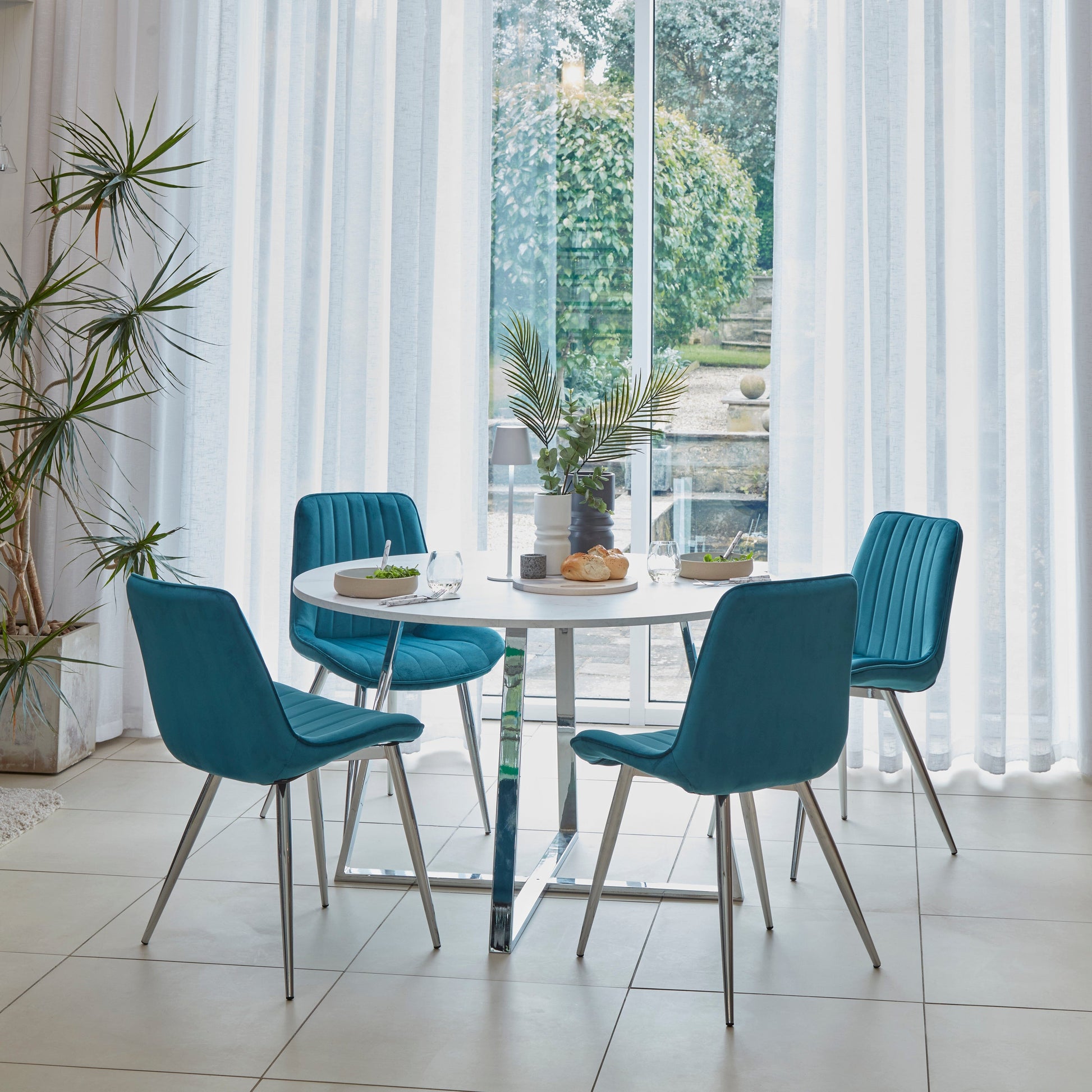 Bella Teal Dining Chairs with Chrome Legs - Laura James