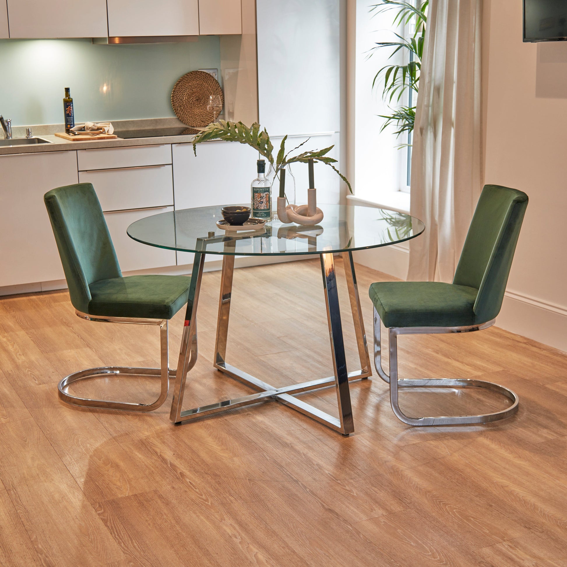 Clara Glass Dining Table Set - 4 Seater - Lola Green Dining Chairs with Chrome Legs - Laura James