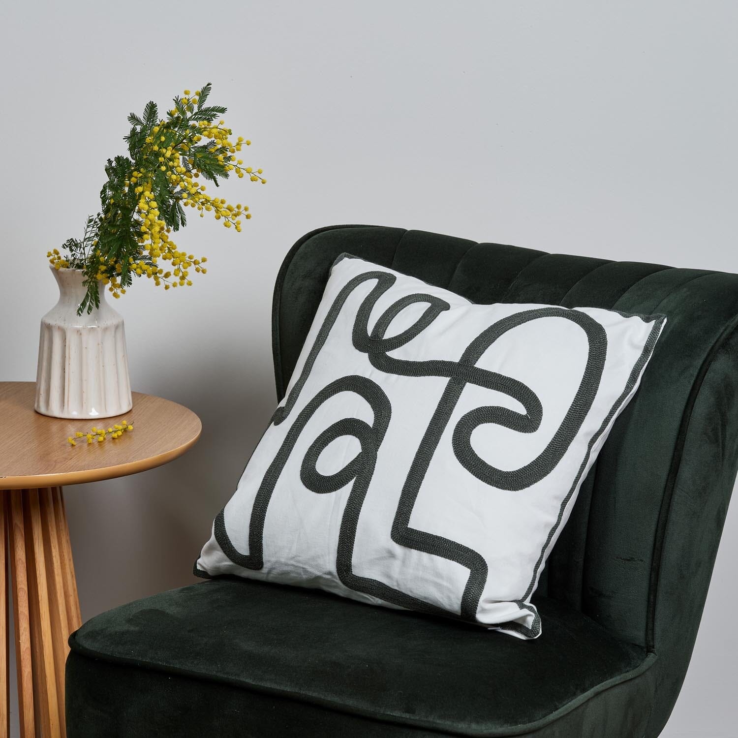 Green line embroidered cushion cover - Laura James