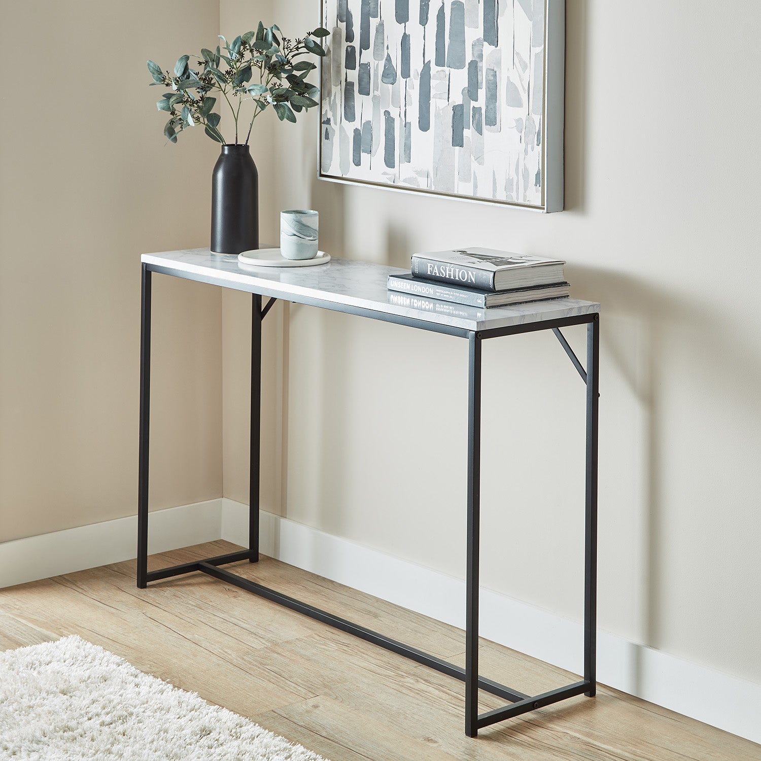 Jay console table - marble effect and black - Laura James