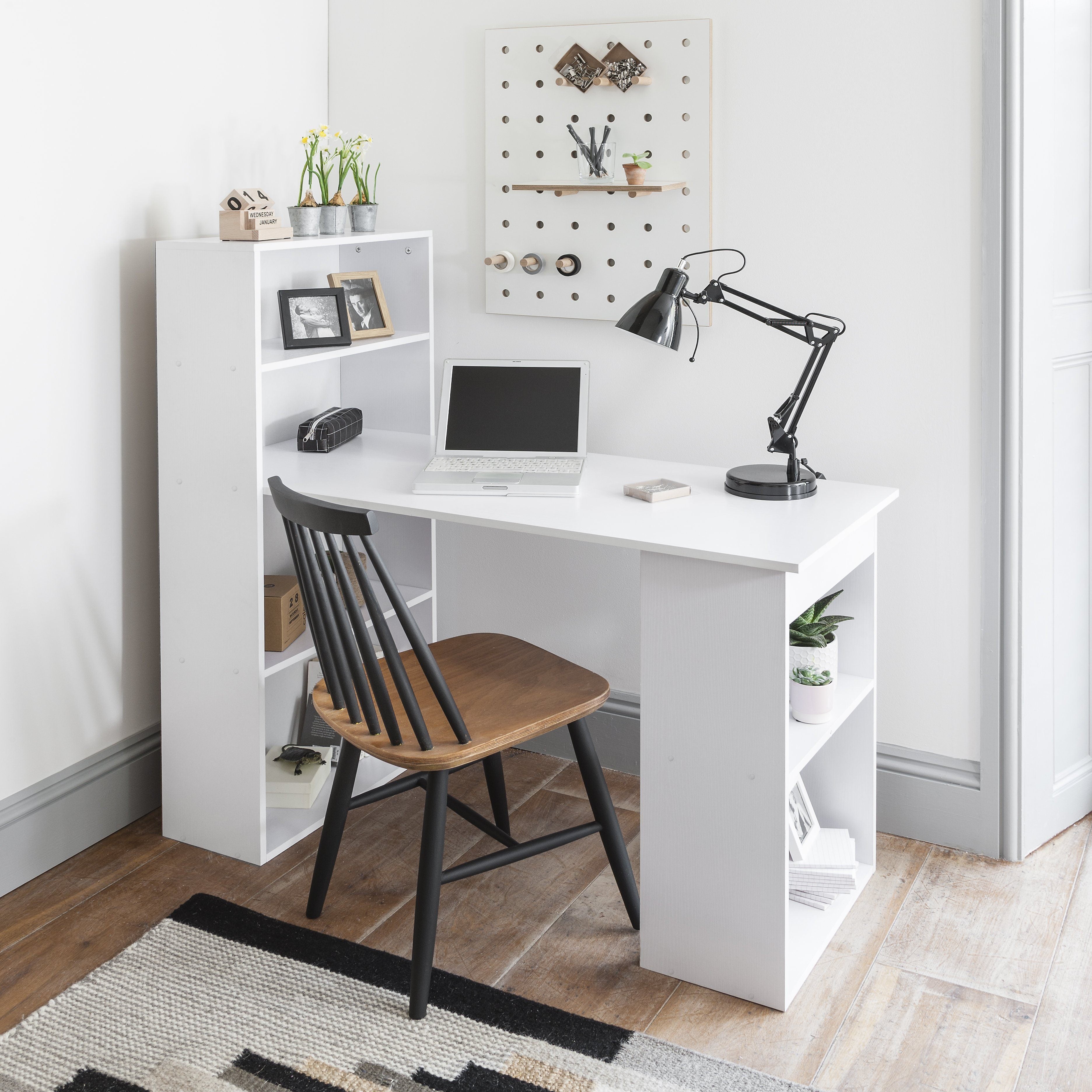 White desk deals with open shelves