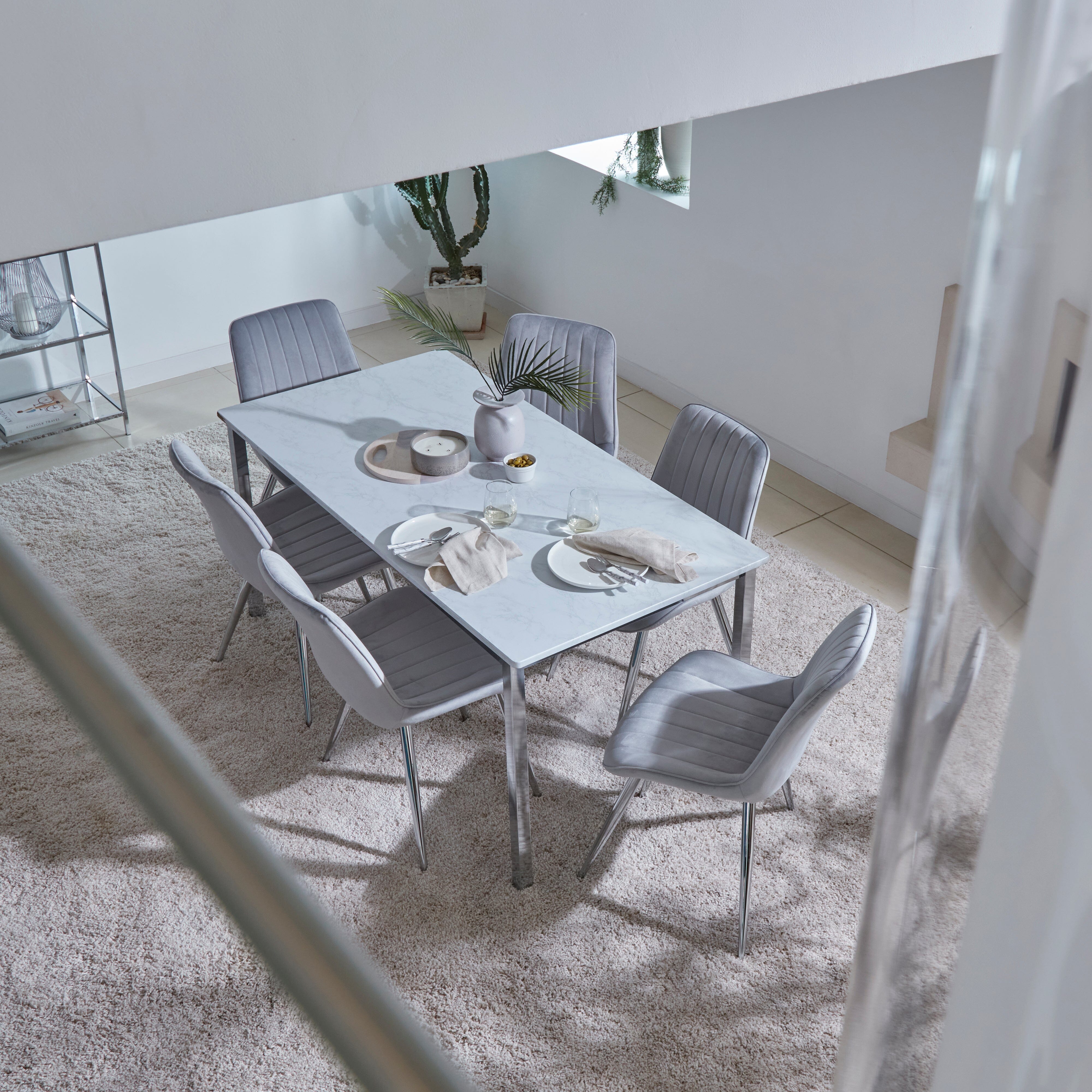 Grey and chrome dining 2024 table and chairs